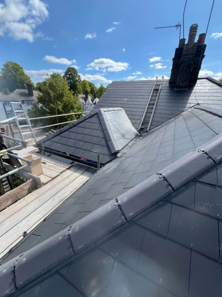 Moseley Roofing team working on a roof in Birmingham